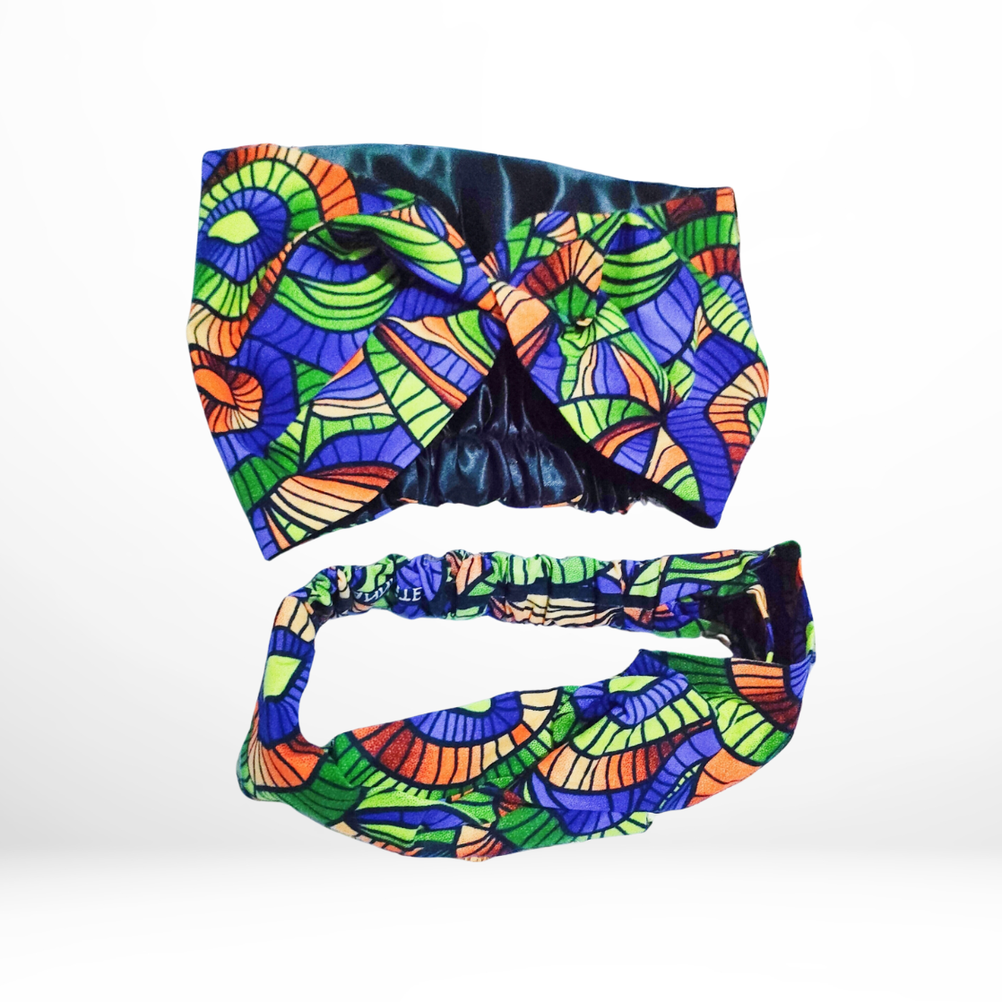 Green, purple, orange and black piece